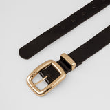 Correa negra con acabado charol