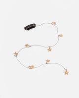 Gancho de cabello con estrellas doradas