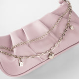 Cartera lila con correa trenzada