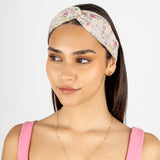 Vincha floral en tono crema