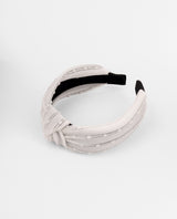 Vincha blanca con textura de puntos