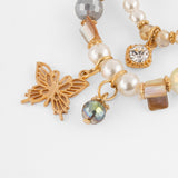 Set de pulseras doradas con dije mariposa